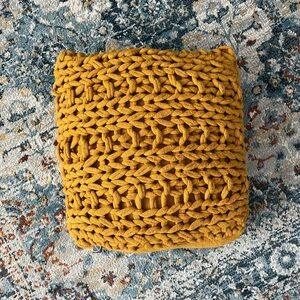 Knitted yellow pillow